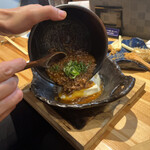 北新地ここの - 麻婆豆腐を熱々の陶板に入れるのです！