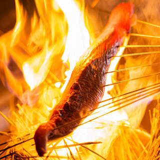 Seasonal Seafood and Kuroge Wagyu beef grilled over straw and charcoal.