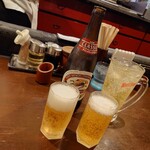 博多麺房 赤のれん - 瓶ビール (中瓶) ＆沖縄ハイボール