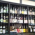 なつ家 - 店内酒棚