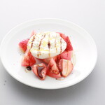 Luxury caprese with burrata cheese and tomato