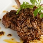 Grilled bone-in lamb with herbs