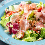 Prosciutto with tomatoes and nuts
