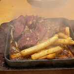 もつ焼きおとんば - 牛ハラミのガリバタ焼き