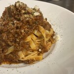 Bolognese slowly stewed with tomatoes and red wine