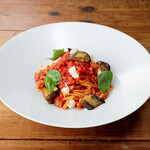 Italian Cuisine sausage and eggplant tomato pasta with mozzarella