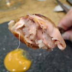 レヴォ - 〜L‘evo鶏〜鶏ムネ肉と鶏モモ肉、クマの内蔵とクマの手、ライスを詰めたもの