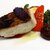 PRIMO - 料理写真:三重県産真鯛の炭火焼き　熟れたトマトのロースト　黒オリーブソース（2023.6）