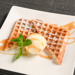 Freshly baked waffles with caramel sauce ~ served with vanilla ice cream ~