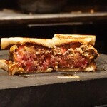 Nishiazabu Yakiniku X - Tajima Wagyu Burger Sandwich with Échiré Butter, Teriyaki Sauce, and Wasabi Mayonnaise