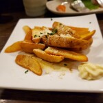 串坊 - アンチョビポテト(これも名物)