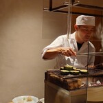 温石 - 黒鯥の皮を炭でジュッと