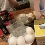 Tsubushitate Yakitori Omicchan - メニューにはちいさーく生卵サービス表記あり