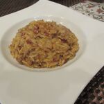 トラットリア フィオーレ - 料理写真:お米のようなパスタ。辛くて美味しいです。