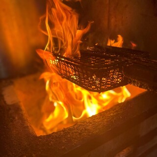 当店一押しのメニューは、赤鶏の黒焼きと鮮魚を使ったお刺身