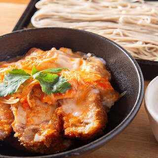 We recommend the "Thick Katsu-don (Pork cutlet bowl) and Soba" set and the spicy "Tsukesoba"