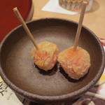 新宿割烹 中嶋 - ご主人からのサービス。小さなトマトをパルメジャーノとパン粉を纏わせ揚げたもの。とてもおつなものでした。