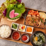 Beef bulgogi set meal with colorful wrapped vegetables