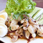Spicy squid salad with herbs