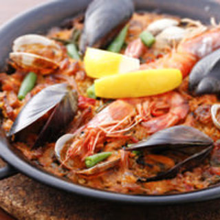 Our proud "Paella" and Ajillo made with carefully selected ingredients since our opening