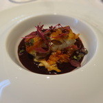 レストラン イリエ ル ジョワイユー - 石川県能登産スズキのポワレ　タンドリースパイスの効いたクワイと白菜のブレゼ　北アルプス天然水のみで仕上げた濃厚な岩手県産黒米のクーリ