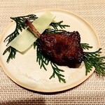 unis - 骨にとうもろこしの皮をまいて