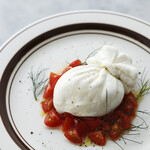 Lots of tomatoes and burrata