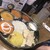 エリックサウス - 料理写真:ミールスという、菜食メニュー。豆のせんべいみたいなのを割ったところ。レモンサワーは200円だった。