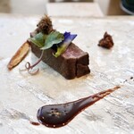 トゥ・ラ・ジョア イズム - 赤牛ロースト