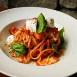 spaghetti with tomato and mozzarella cheese