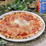 Bismarck pizza with chopped Prosciutto and soft-boiled eggs