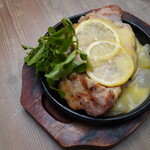 Tender grilled pork loin with garlic lemon sauce