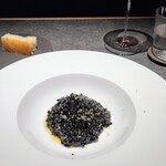 malca - イカスミリゾット。コクがすごいのだけれど、後味が重くなくて。混ざっているイカの歯ざわりもいい感じ