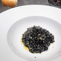malca - イカの墨袋を集めて作られた限定こだわりイカスミリゾット。墨感しっかり濃く口当たりまったりだけど魚介らしい重くない後味がまたいい☆