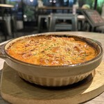 SDT TOKYO - 鶏もも肉とローズマリーのトマトクリームグラタン。
