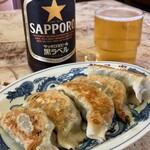 龍巳家 - ビール中瓶 ¥500 餃子 ¥350