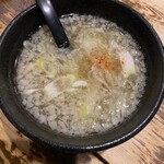 ヒャクブンノイチ - 鶏塩にんにくつけ麺スープ⇒背脂たっぷり入っていて 良くにんにくが きいています。