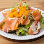 Caesar salad with smoked salmon and mimolette