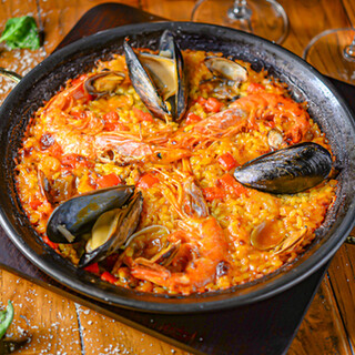 Delicious seafood paella cooked using traditional methods