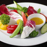 Warm seasonal vegetable salad with bagna cauda sauce