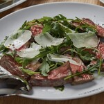 Hokkaido red beef tagliata with arugula and parmesan