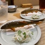 食堂 おがわ - “鮎の唐揚げ”。唐揚げにしたら今までの鮎とは違う新しい味わい。泳ぐ姿もこうなる様に揚げたとか。美しいです！