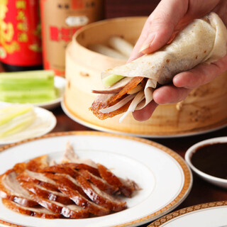 Uses a special wood-fired oven!! Authentic Peking duck