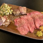 弱肉強食 - 和牛タン塩、黒毛和牛タンのオイル漬け　
            