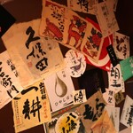 古美術茶亭 もちづき - トイレの中。日本酒のラベル？