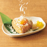 Onigiri rice ball topped with cheese and egg