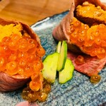 Meat-wrapped sea urchin salmon roe Gunkan