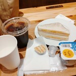 喫茶店 ピノキオ - モーニング　玉子とハムのサンドイッチとアイスコーヒー　ヨーグルトもつくよ