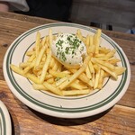 French fries topped with whipped butter