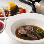 スペイン料理 クエバソル - カタルーニャ風野菜のグリル＆イベリコ豚ほほ肉の赤ワイン煮込み